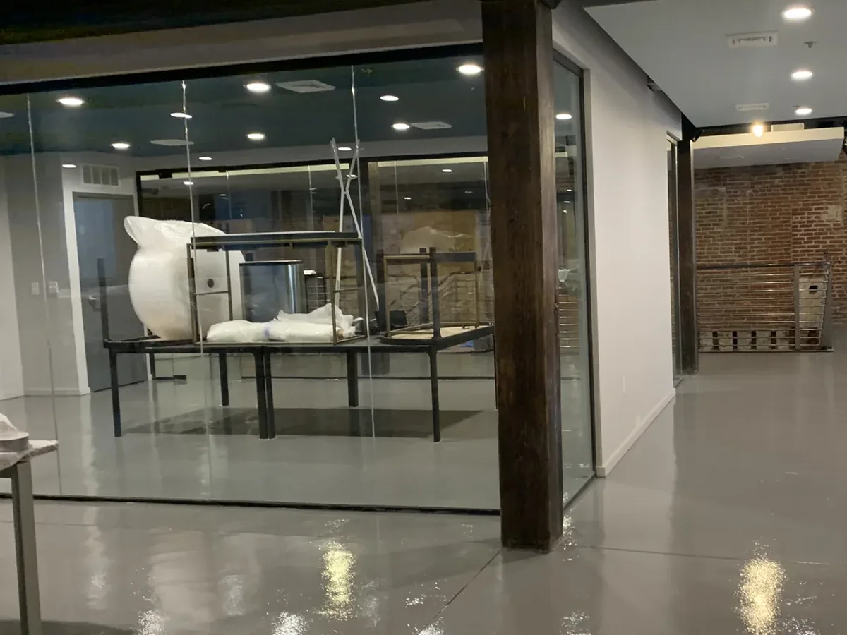 Solid color epoxy floor in a corporate headquarters entry