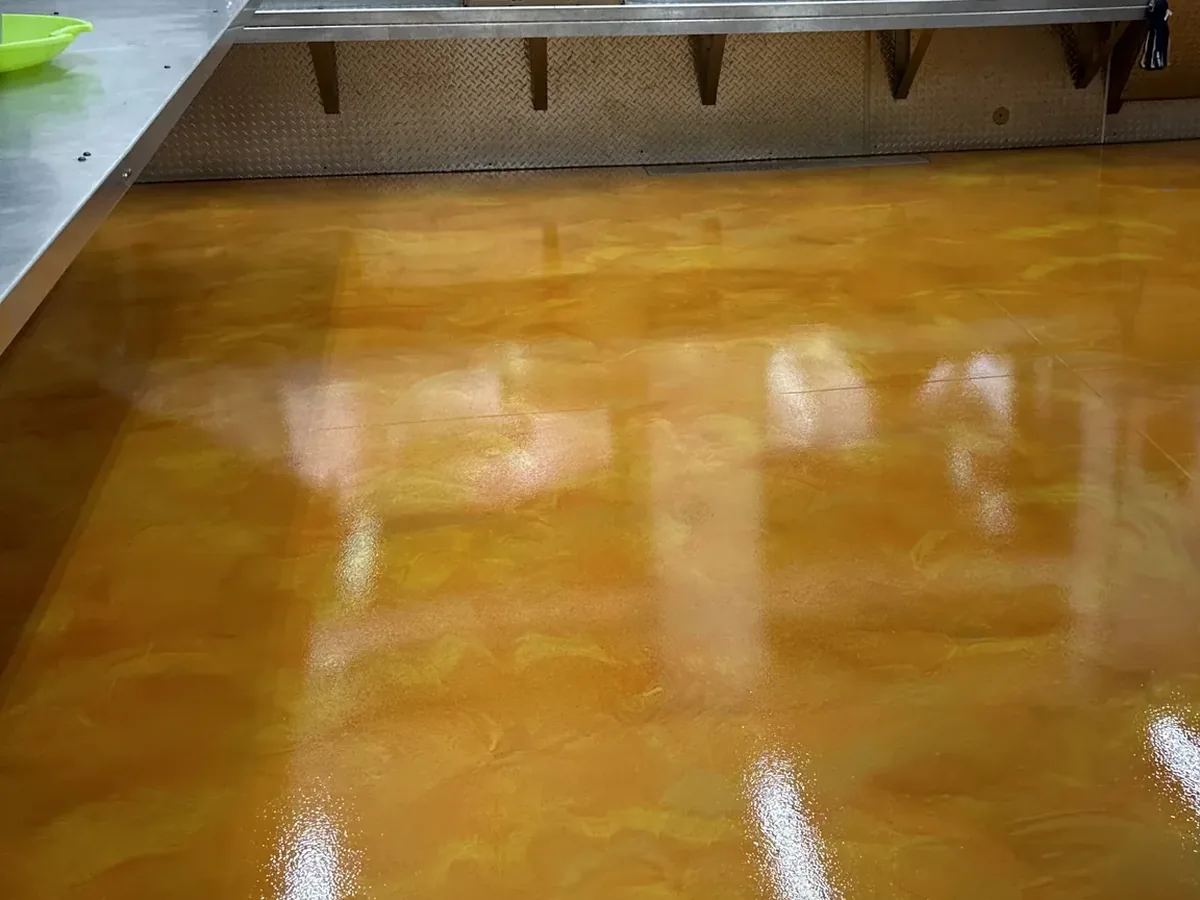 Matte orange metallic epoxy floor