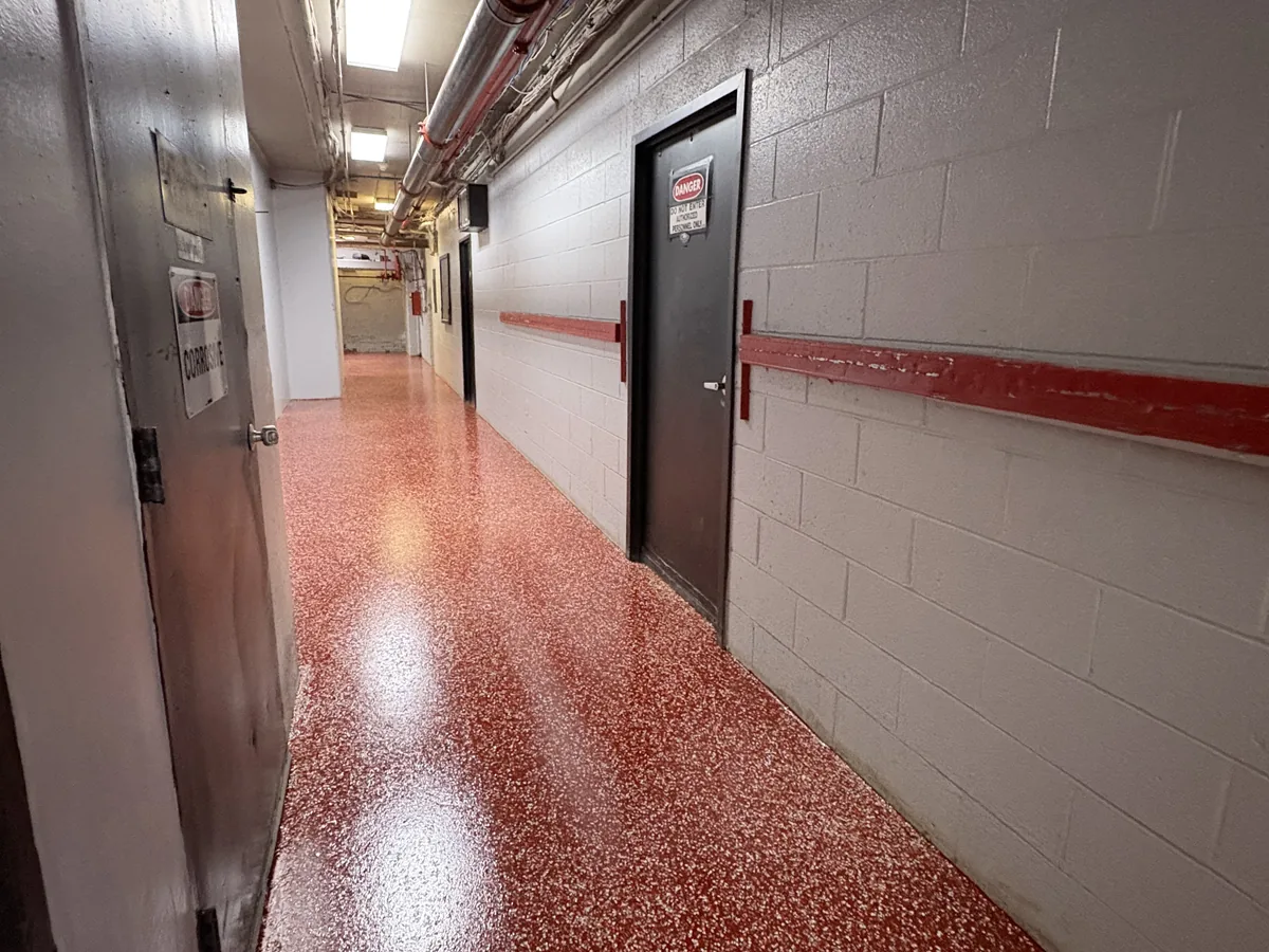 Red flake epoxy corridor in an industrial facility