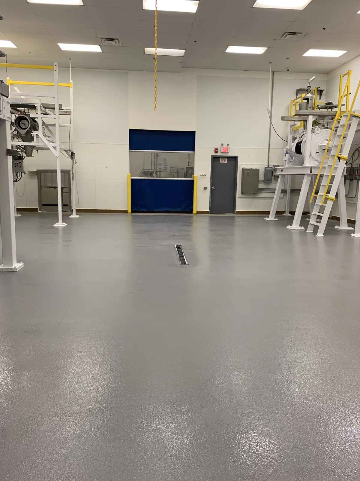 Urethane cement floor and cove base in a food production room