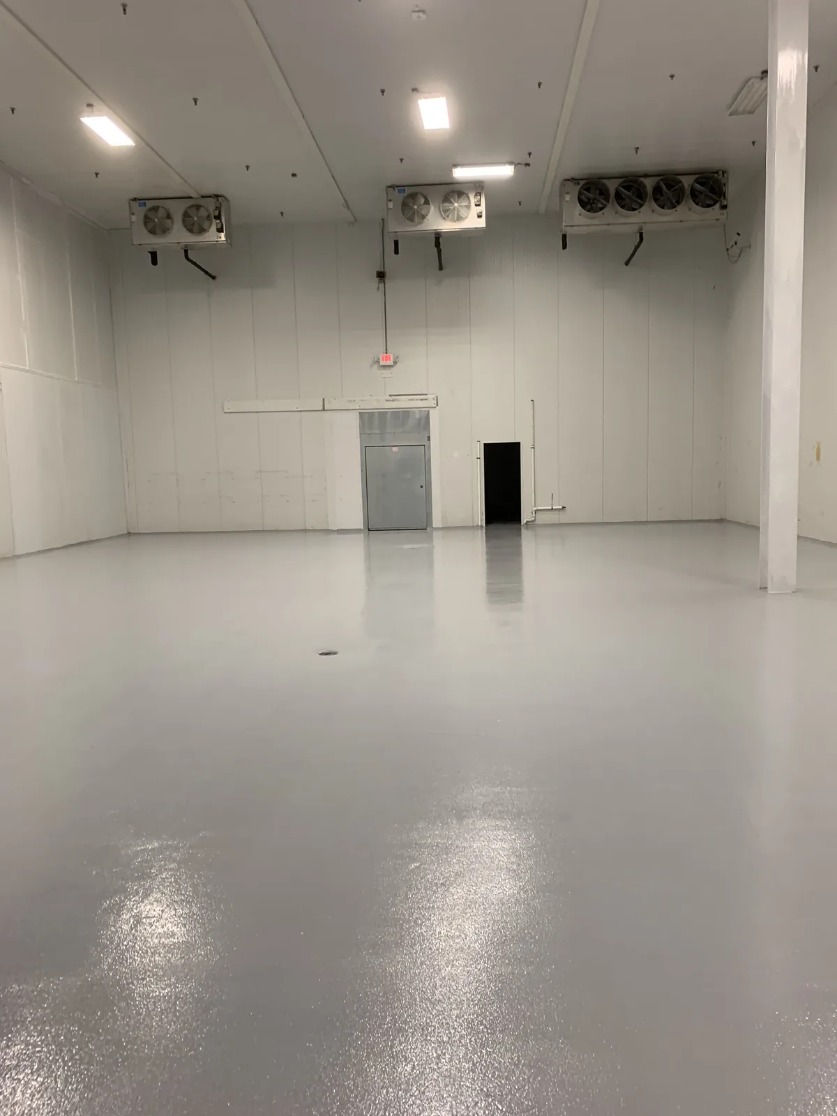 Urethane cement floor inside a walk-in commercial refrigerator