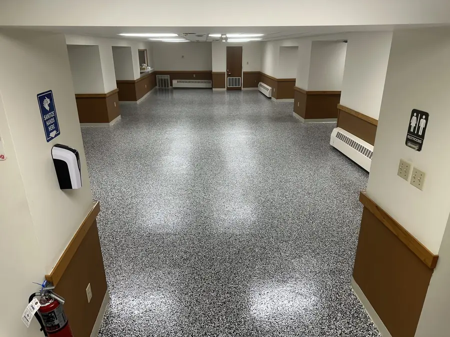 Lower-level floor after full-broadcast flake epoxy