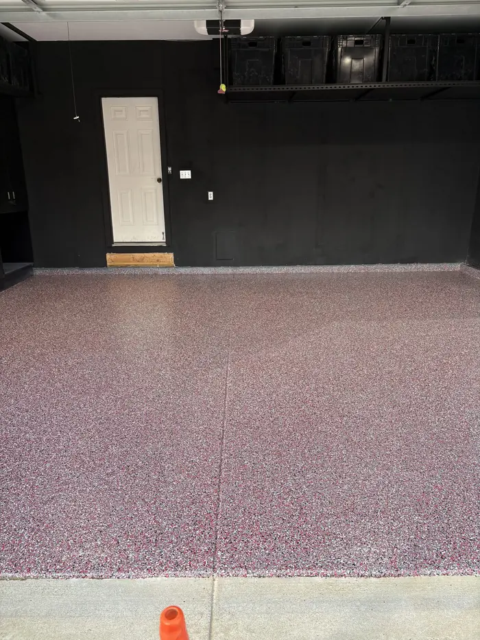 Full-broadcast flake epoxy garage floor by Liberty Epoxy