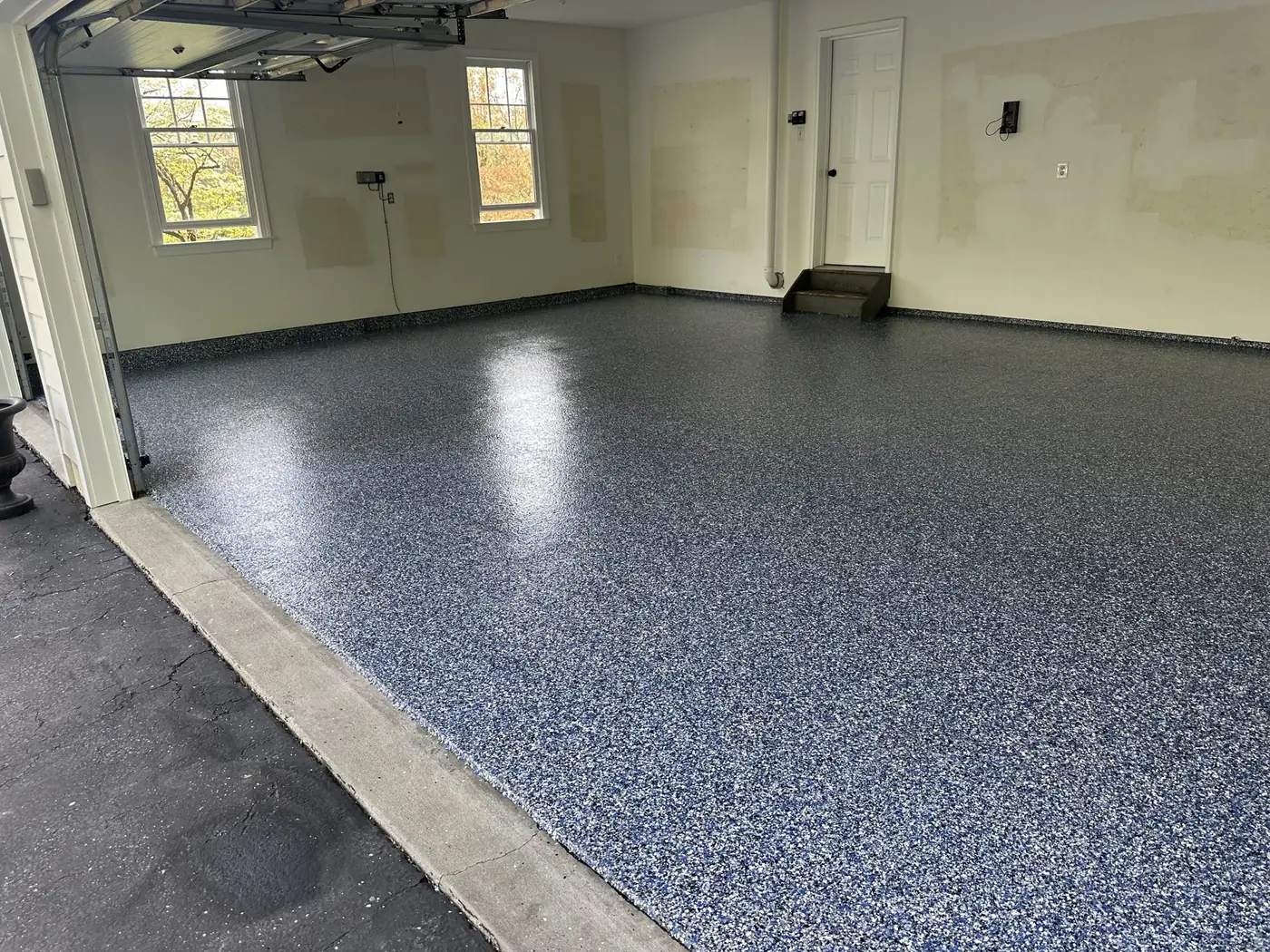 Bright flake epoxy two-car garage floor by Liberty Epoxy