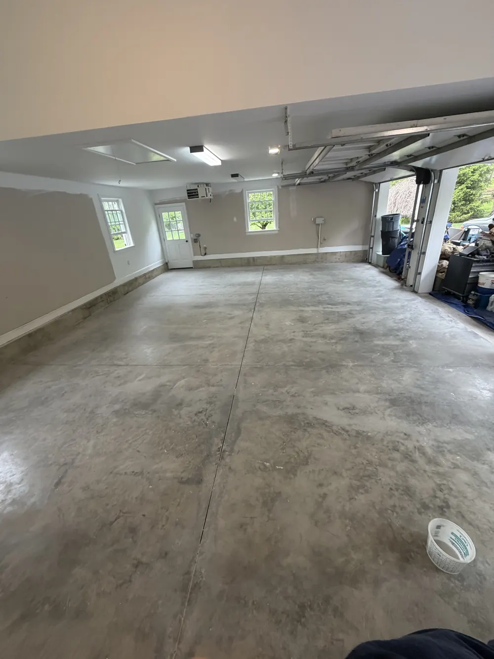 Same brick garage floor before coating