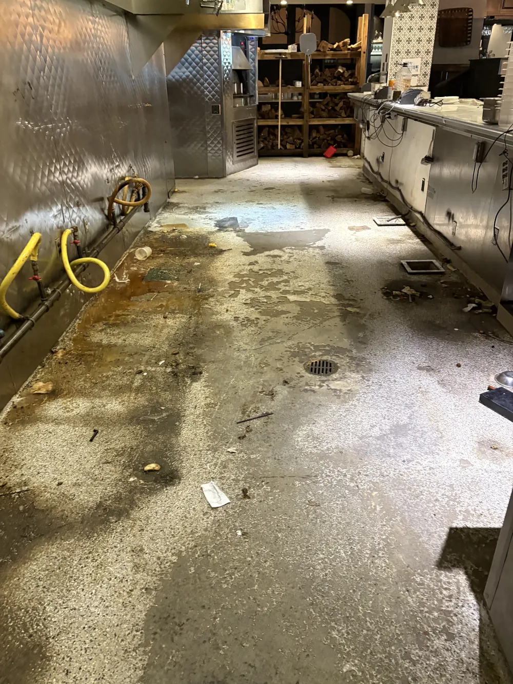 Commercial kitchen line floor before coating